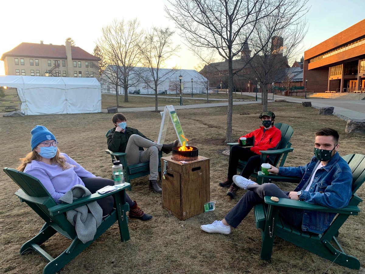 UVM students safely socializing on a Vermont spring eve.